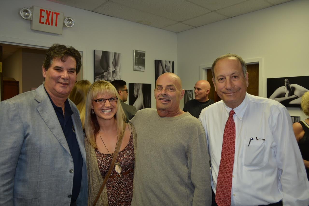 Dr. Mandell-Brown and group of people posing for camera