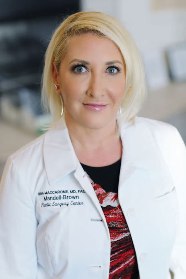Portrait of Dr. Gina Maccarone smiling wearing white coat